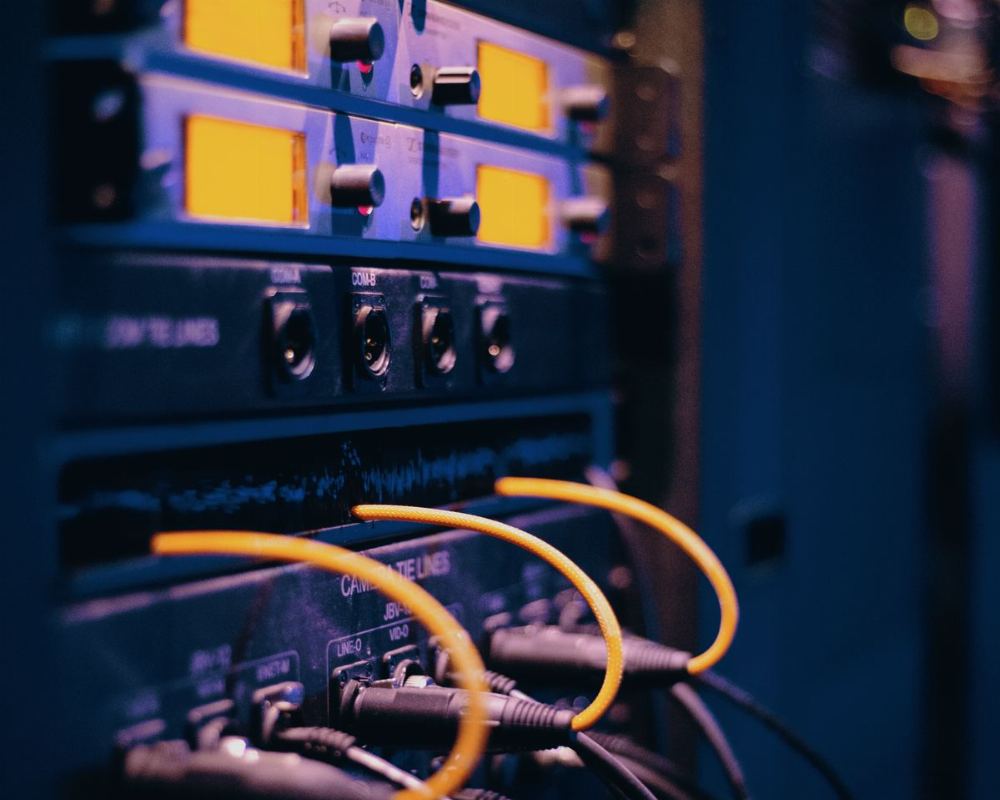 Network cables plugged into a server rack